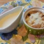 Rum-Raisin and Apple Bread Pudding with Vanilla Sauce