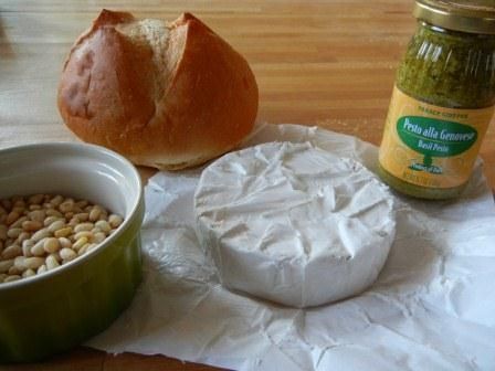 Baked Brie with Pesto and pine nuts